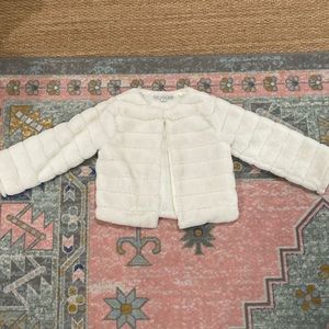 white faux fur jacket